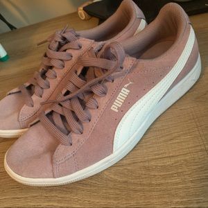 Purple PUMA sneakers